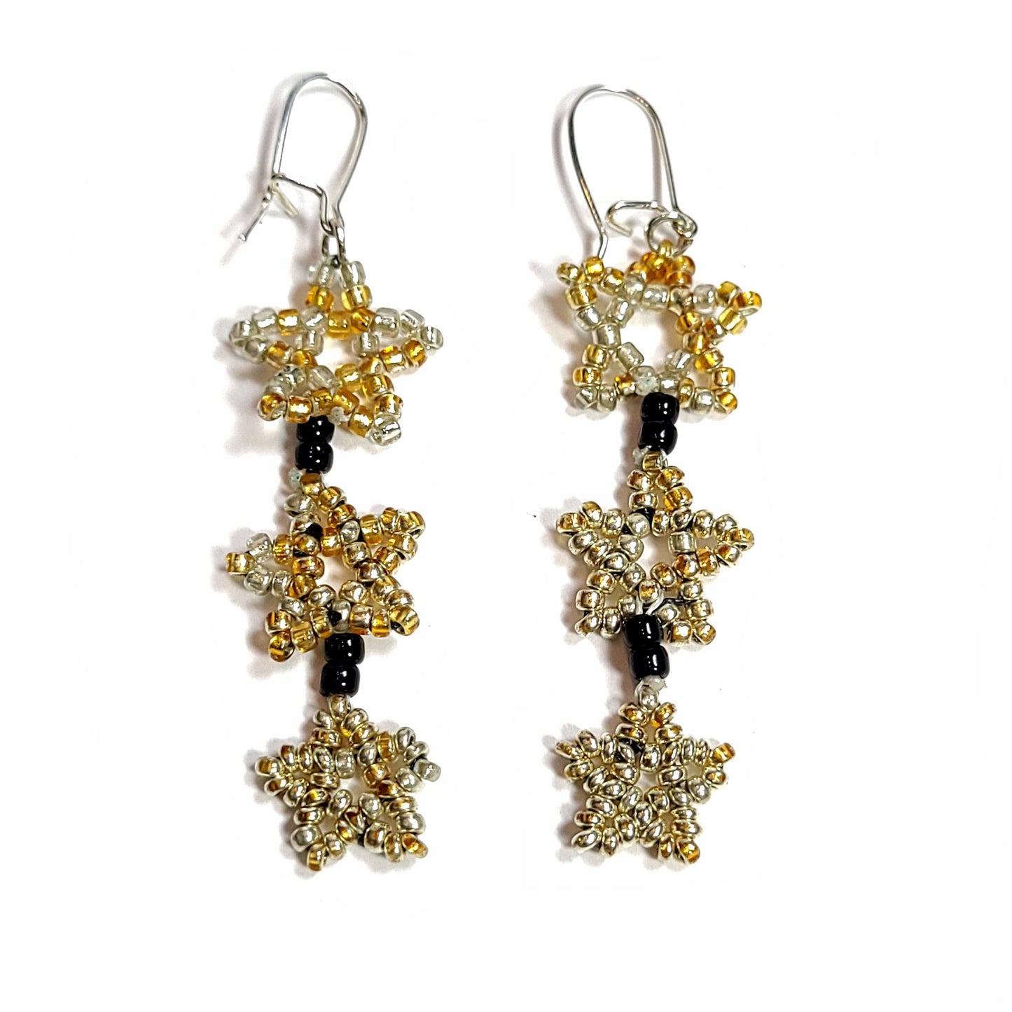 Dangly earrings made of three beaded stars on each earring.