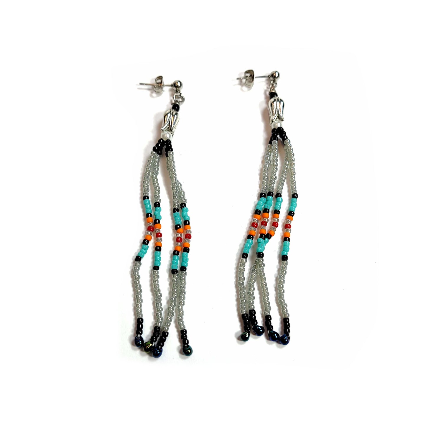 Southwest style fringe earrings with yucca flower caps.