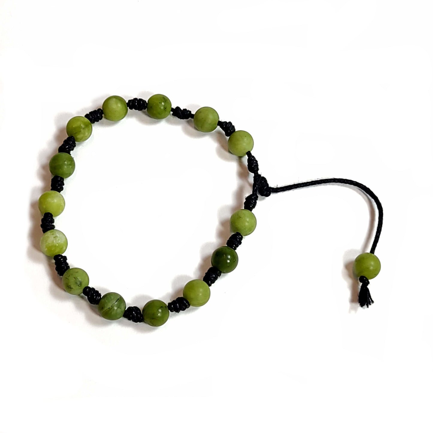Handmade, hand knotted black cord, medium green matte finish aventurine beaded bracelet. Adjustable slip knot with one pull cord for adjusting the fit.