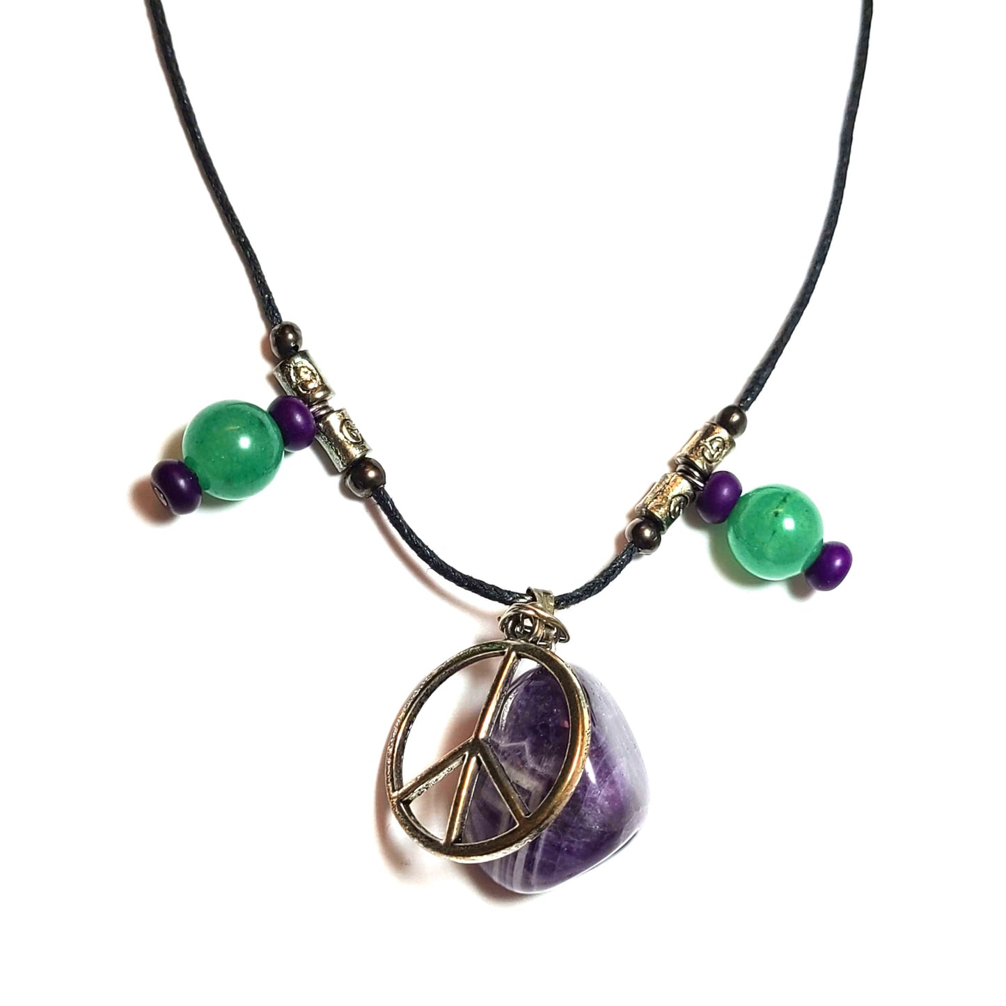 Amethyst pendant with peace sign charm with decorative beads necklace close up