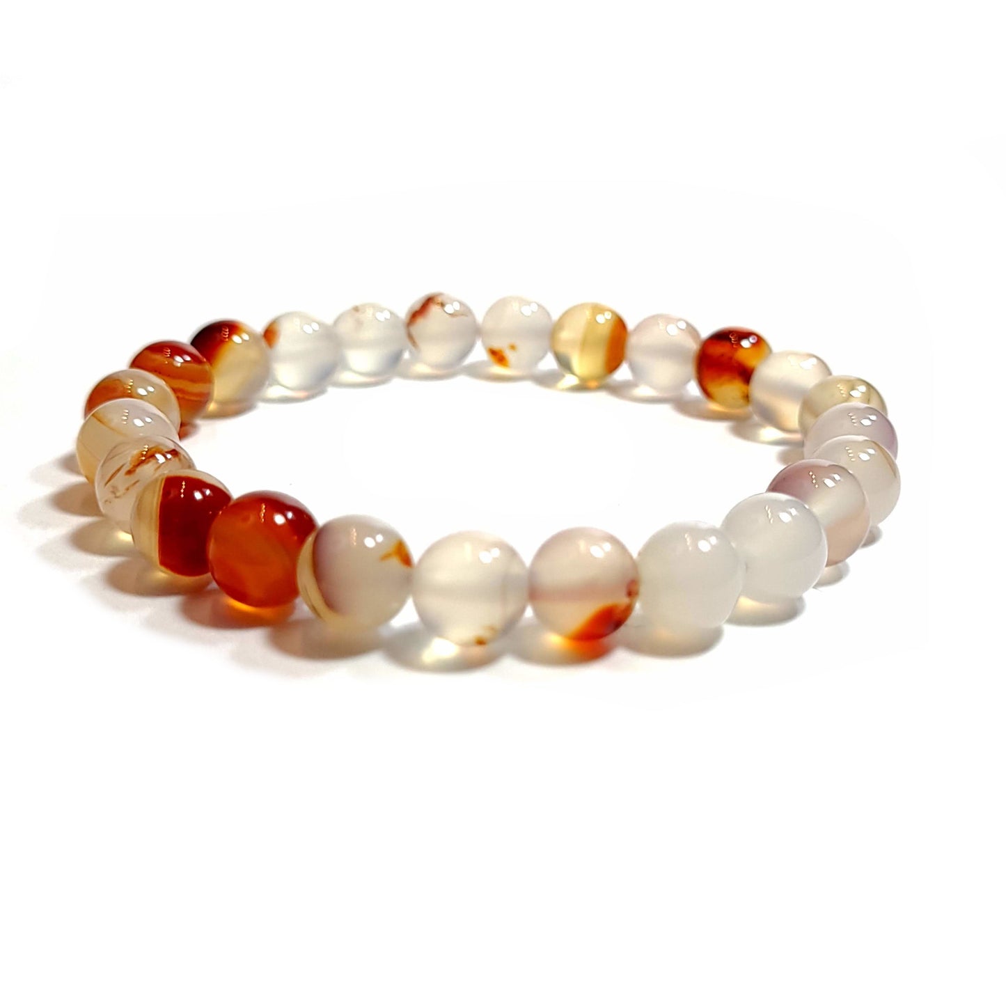 Bracelet made of milky white, orange, and brown agate 8mm beads strung with elastic.