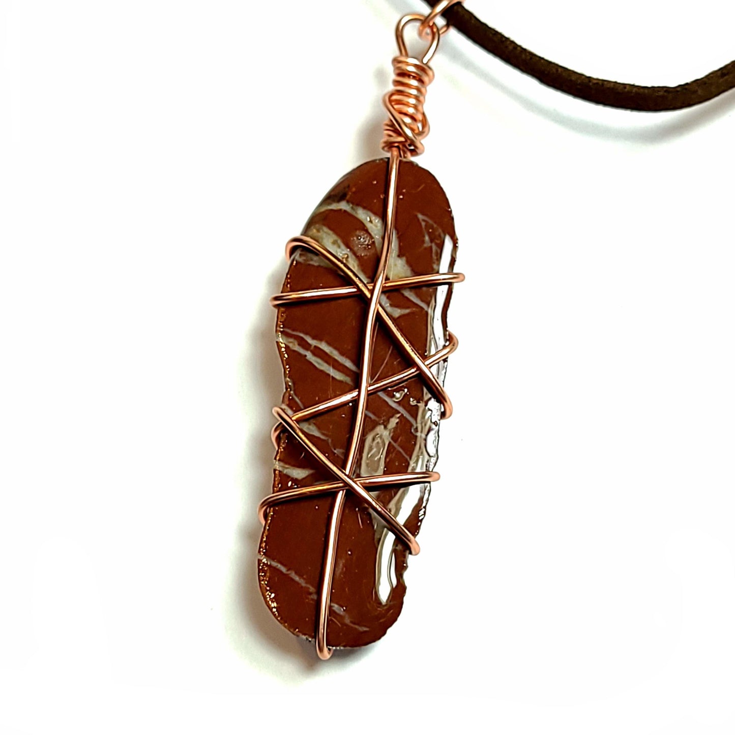 Red jasper with white stripes, stone coated in resin, wrapped with copper wire on a leather necklace with a 2 inch extender.