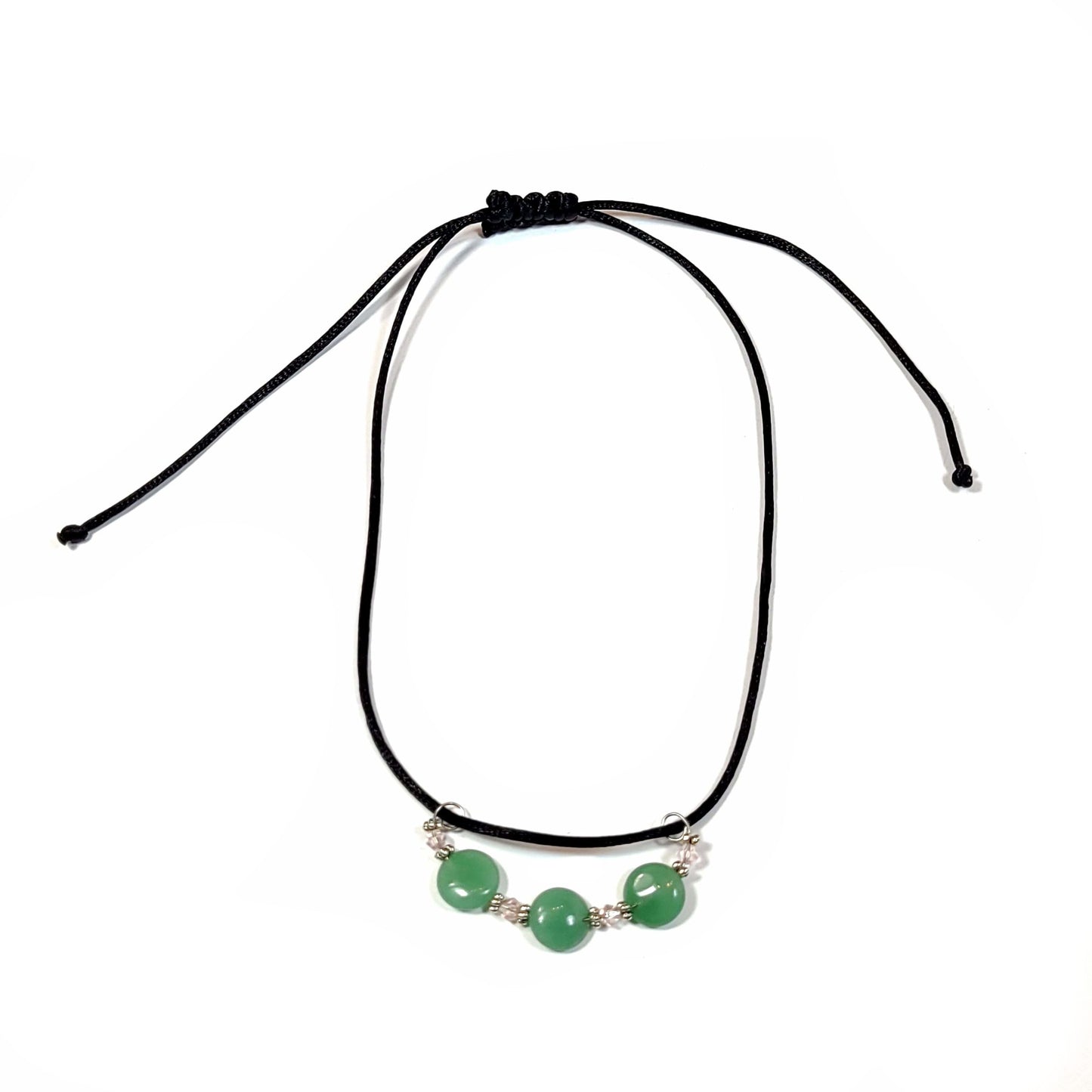 Necklace made with a satin cord and has a 3 aventurine disc beads pendant.