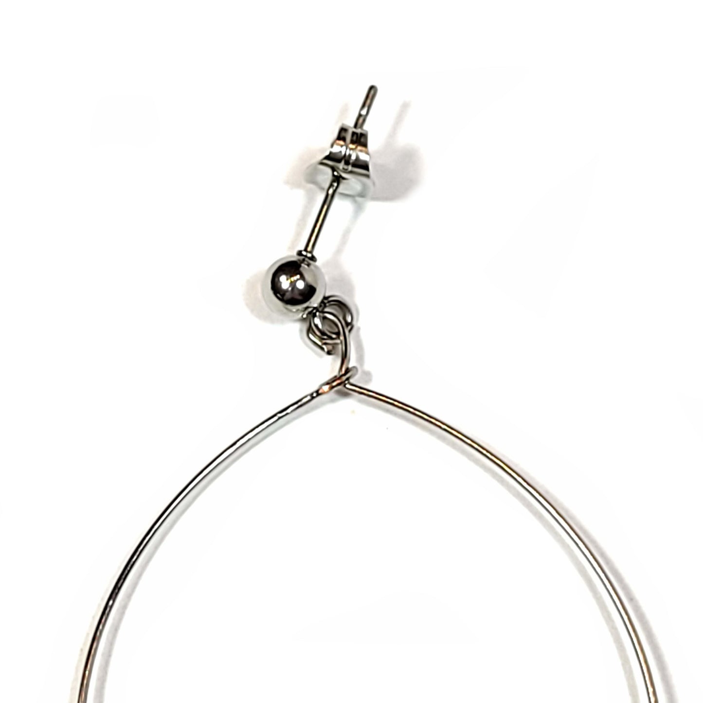 Silver color hoop earrings with two green aventurine disc beads and 3 pale pink glass bicone beads with silver color spacer beads. Close up view of the post area.