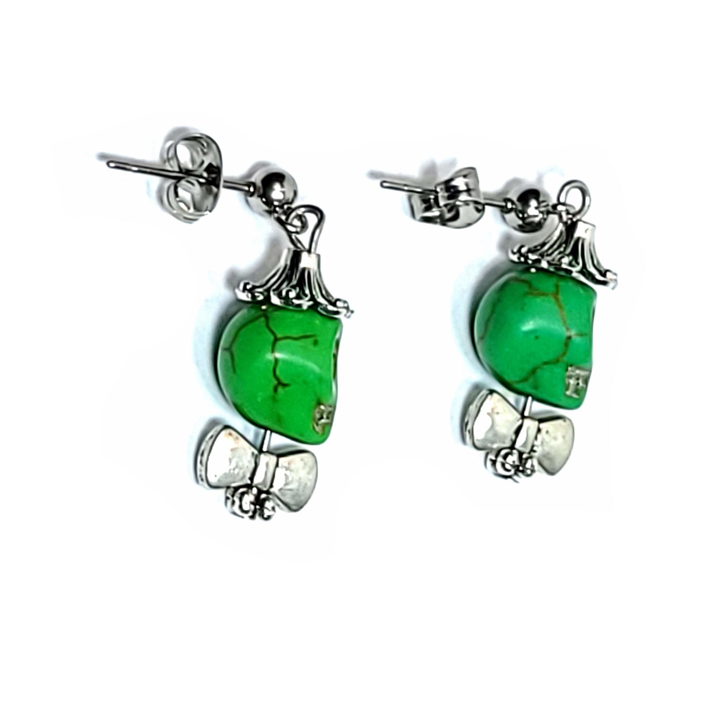 Fun green Sugar Skulls made from dyed Howlite, with silver toned endcap hat, bowtie, and collar buttons. The post earrings and, backs are stainless steel.