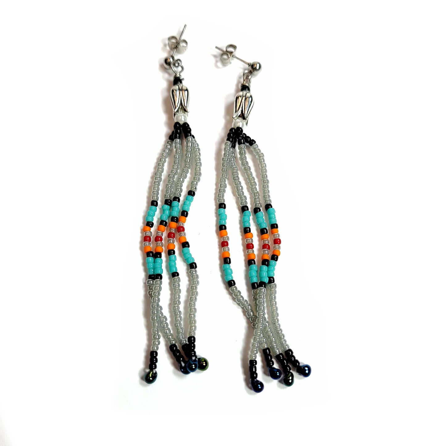 Southwest style fringe earrings with yucca flower caps.