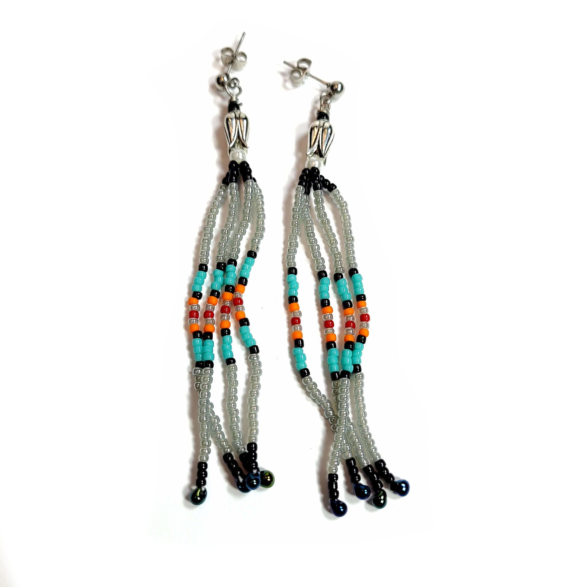 Southwest style fringe earrings with yucca flower caps.
