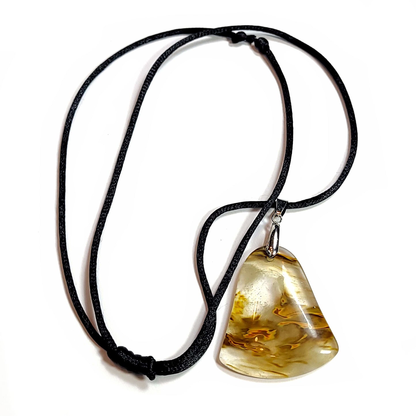 Quartz pendant with interesting occlusions. Comes with a black satin cord with an adjustable slip knot.