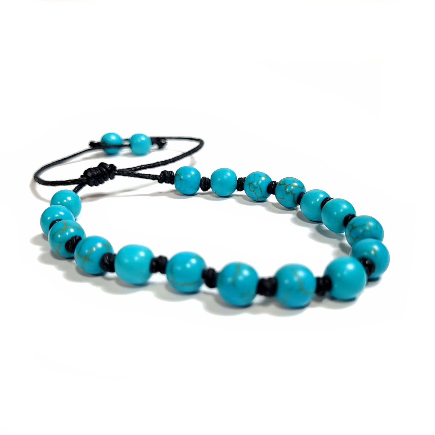 These photos do not do these beads justice as they are a beautiful turquoise color. Handmade knotted blue turquoise dyed Howlite Bracelet/Anklet. Adjustable slip knot makes easy size adjustment.