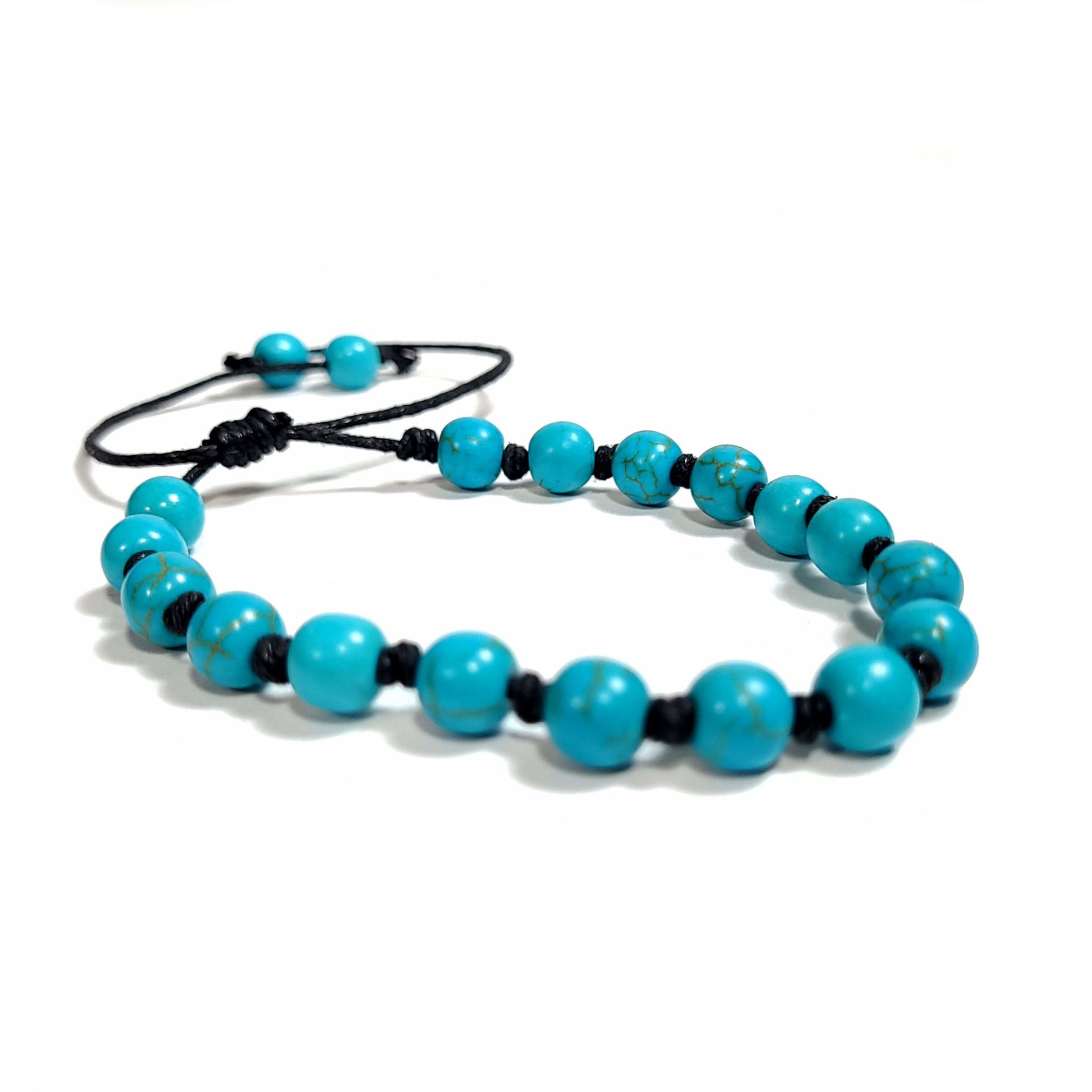 These photos do not do these beads justice as they are a beautiful turquoise color. Handmade knotted blue turquoise dyed Howlite Bracelet/Anklet. Adjustable slip knot makes easy size adjustment.