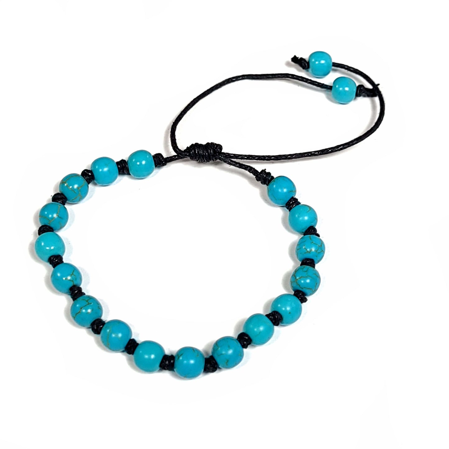 These photos do not do these beads justice as they are a beautiful turquoise color. Handmade knotted blue turquoise dyed Howlite Bracelet/Anklet. Adjustable slip knot makes easy size adjustment.