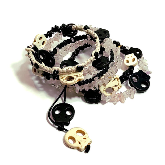 memory wire bracelet made with bone and black color skull beads, black and white beads, black and bone color macrame cord, rose quartz chip beads.