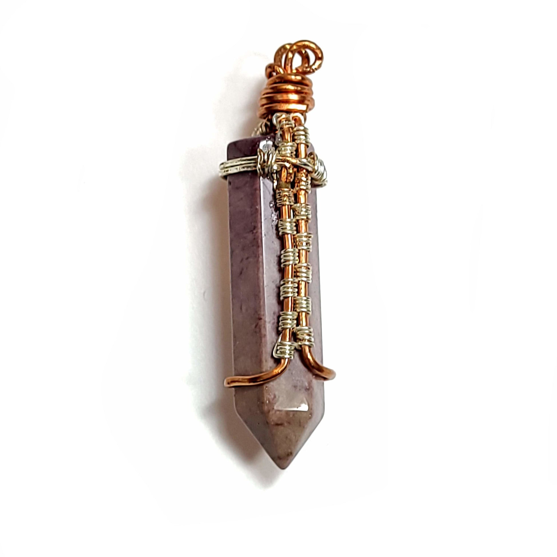 Beautiful jasper pendant hand wrapped with silver colored and copper wire.