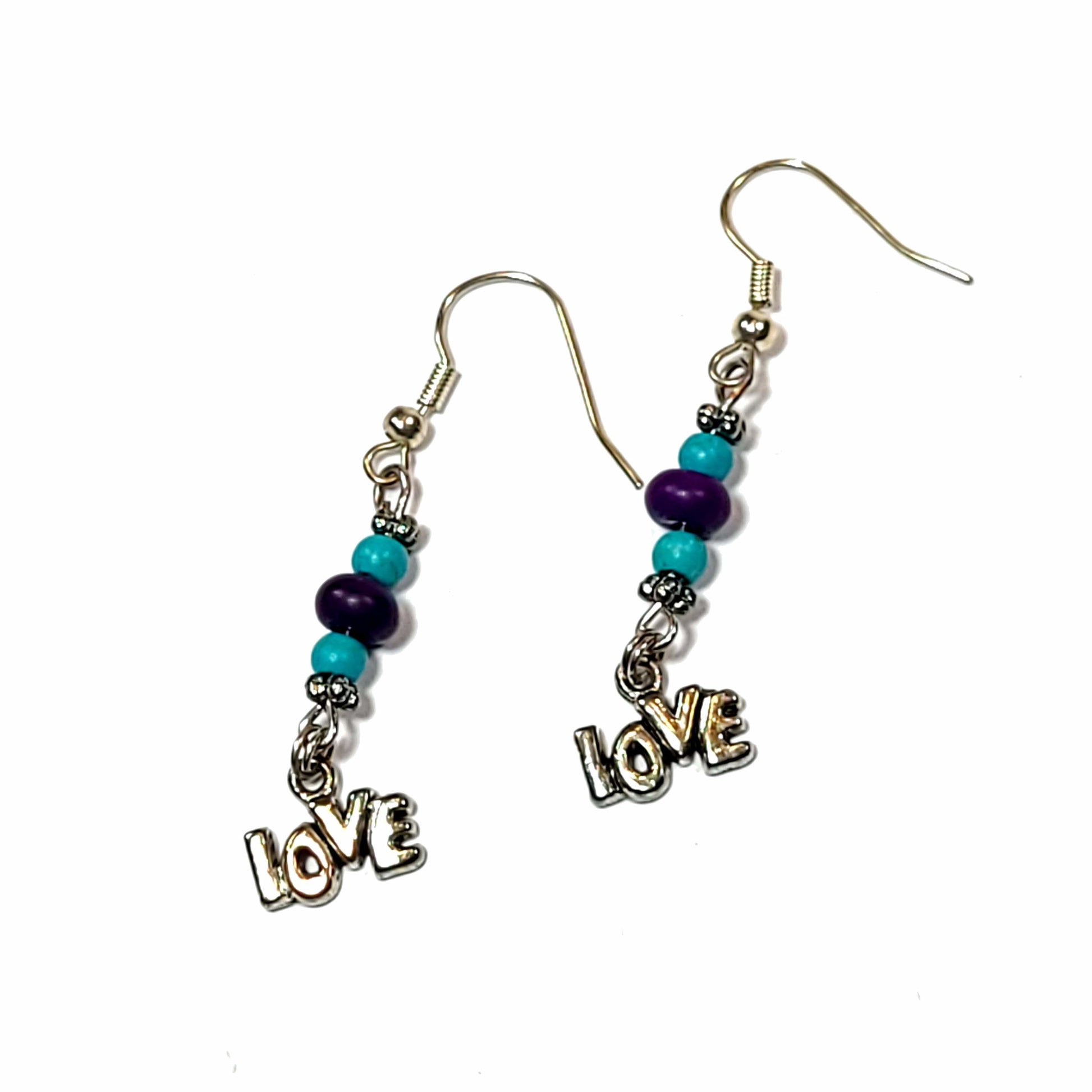 Earrings with ble and purple beads and a Love charm.