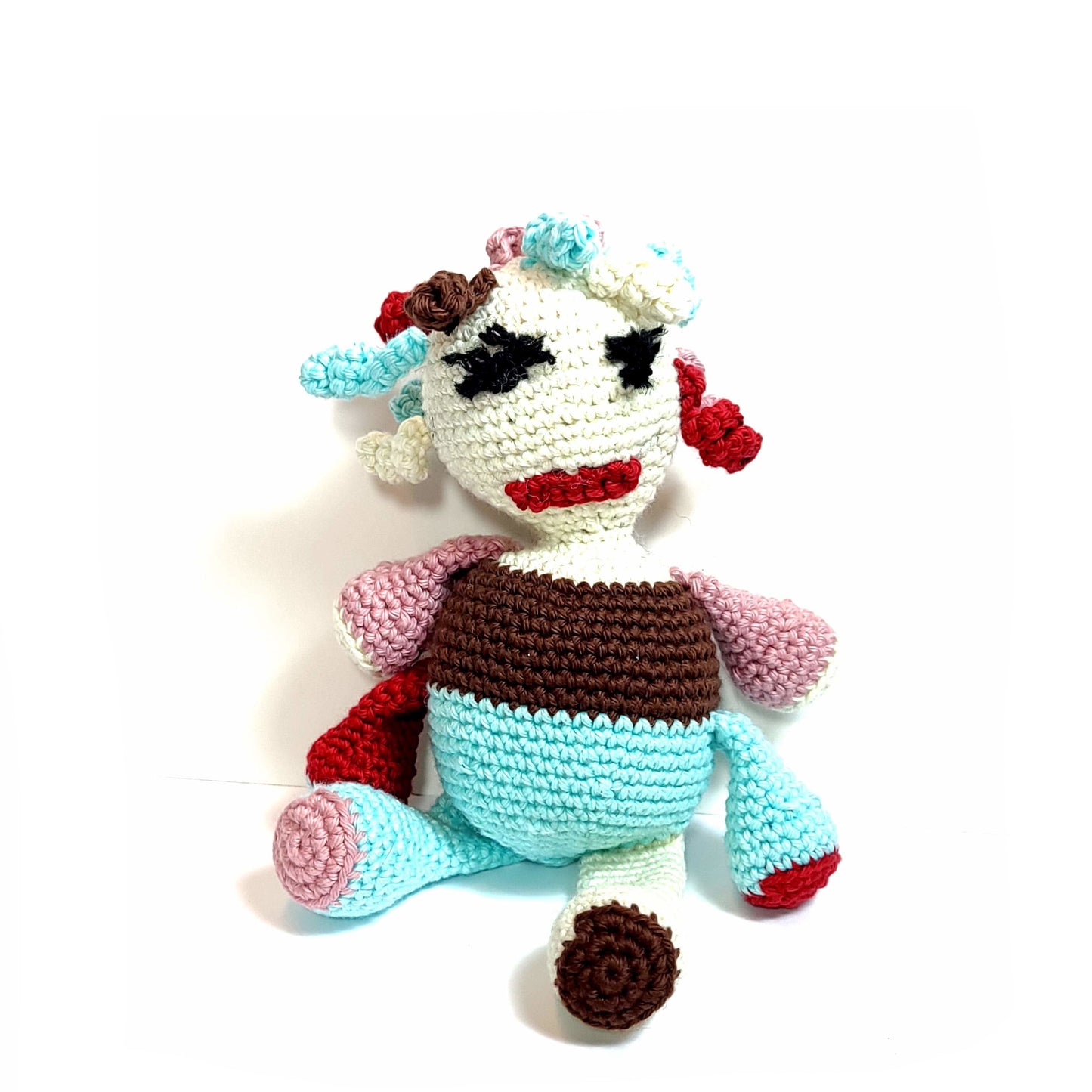 Handmade oddity looking unique clown. Hand-crocheted with soft yarns. White, red, light blue, brown, and pink. 